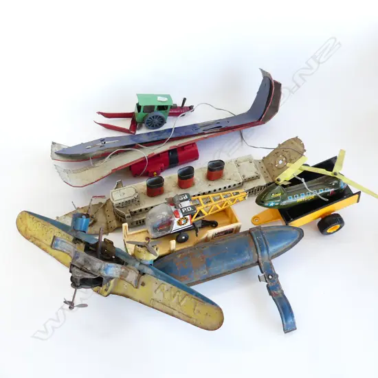 SMALL BOX VINTAGE TIN TOY HELLICOPTERS  & BOAT & PLANE PARTS
