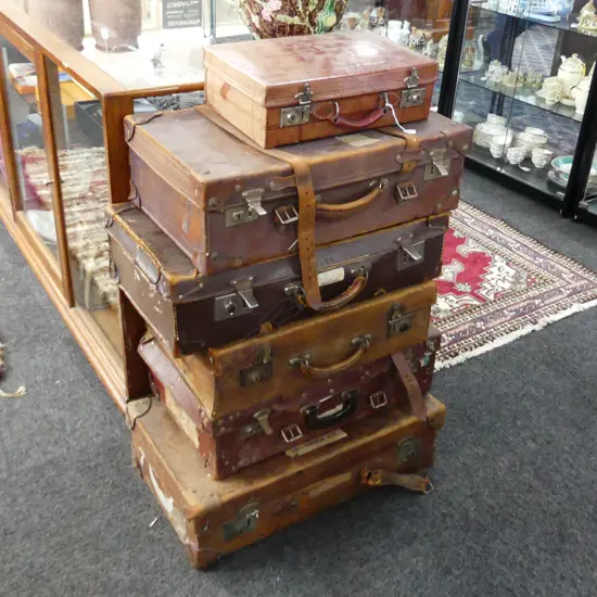 6 VINTAGE LEATHER SUITCASES