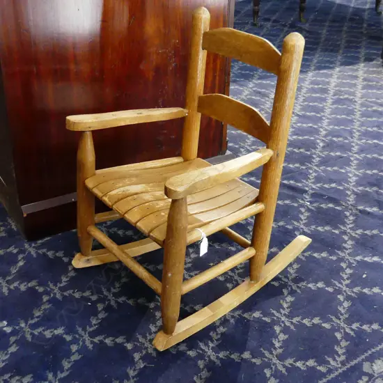 OLD CHILDS ROCKING CHAIR . 