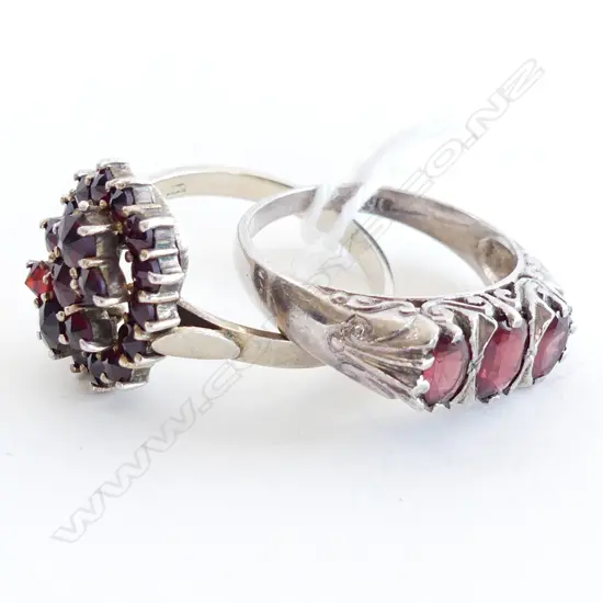 2 STG SILVER DRESS RINGS, ONE WITH GARNETS  & ONE  WITH 3 GARNET BAND