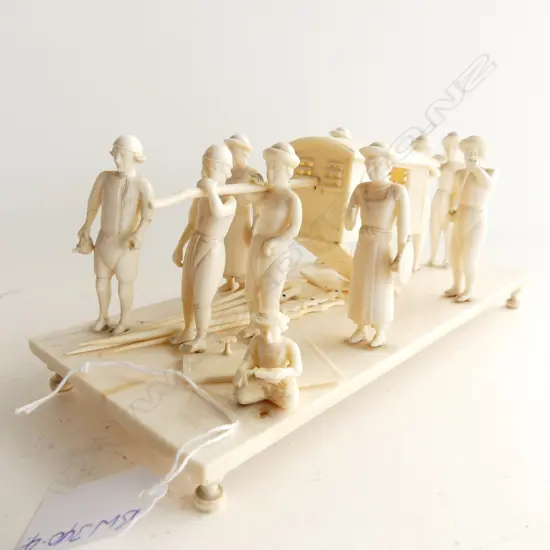 STH EAST ASIAN CARVED IVORY CARRIAGE BEING CARRIED BY ATTENDANTS + SET SWIZZEL STICKS. SOME DAMAGE. L.225mm