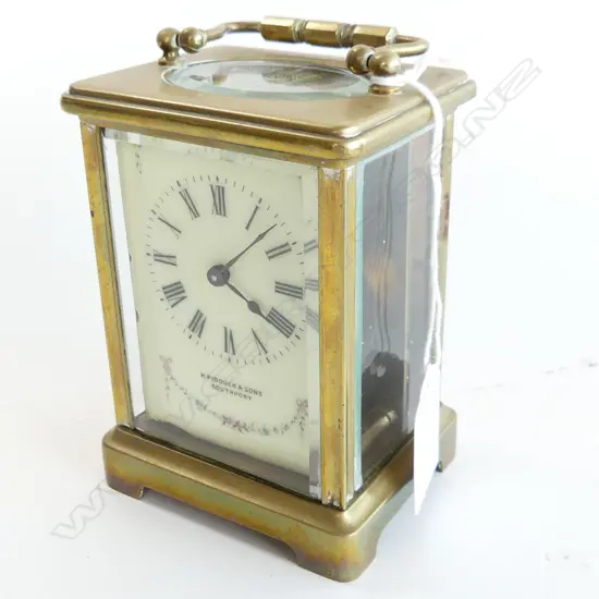 CARRIAGE CLOCK BY R&C PARIS - RETAILED H. PIDDUCK & SONS SOUTHPORT H.110mm w. key
