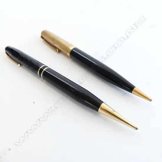 TWO VINTAGE PROPELLING PENCILS BY PARKER & CONWAY STEWART IN BLACK & GOLD 