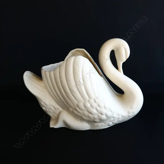 CROWN LYNN LARGE SWAN. FRIT TO RIGHT HAND CORNER . 170 AND 1950S BACKSTAMP. SOME CRAZING L.310mm