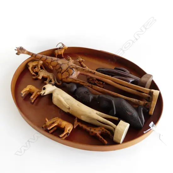 TRAY OF 12 WOODEN CARVED ANIMALS ETC TRAY L. 510mm