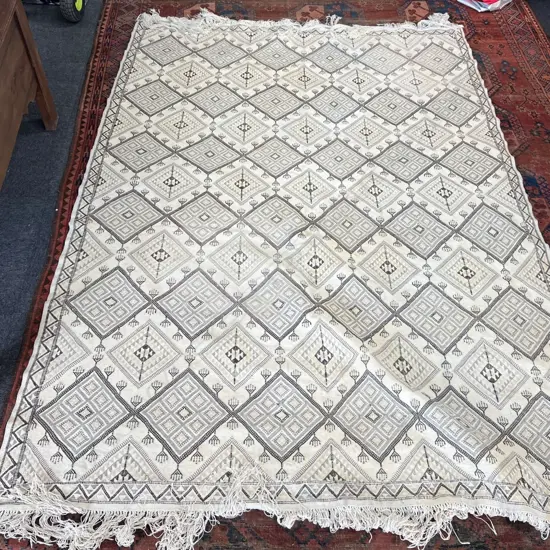 LGE HAND WOVEN PALE WOOL RUG 2700 x 2020mm. labelled to the back 'Tunisie...