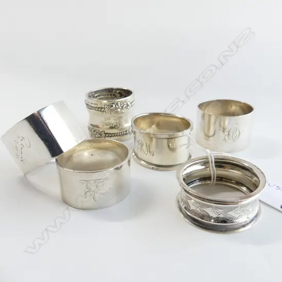 6 ASST. STG SILVER NAPKIN RINGS 186 GRAMS