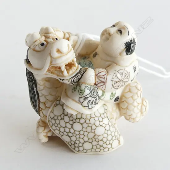 IVORY NETSUKE; MAIN RIDING DRAGON, SIGNED W.40mm