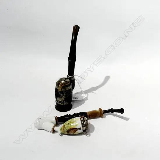 TWO EUROPEAN SMOKERS' PIPES - 1 PORCELAIN WITH PHEASANT, 1 CARVED WITH STAG