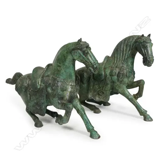 A pair of 20thC Chinese heavy bronze Tang style horses,