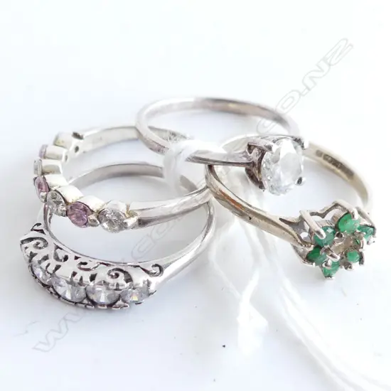 3 SILVER RINGS & 1 W/GOLD RING (1.8 GMS) FAULTS