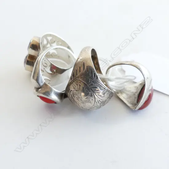 4 DESIGNER SILVER RINGS