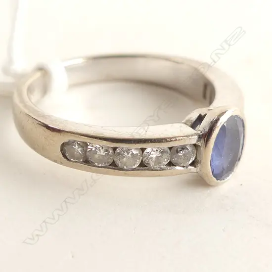 18CT WHITE GOLD SAPPHIRE AND DIAMOND RING