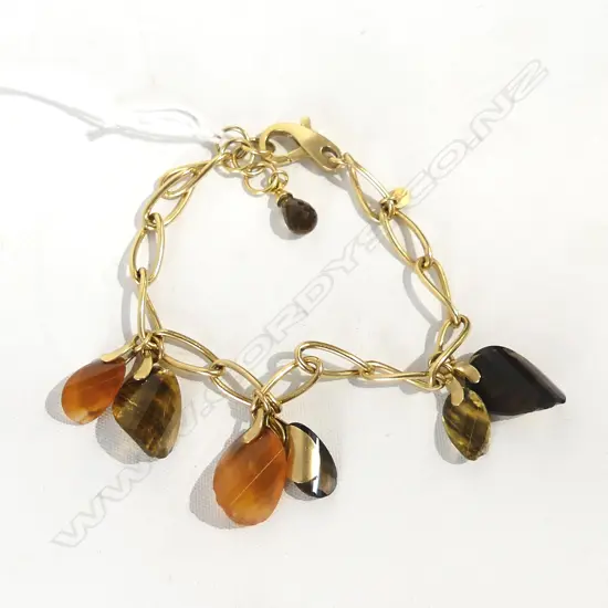 18ct & GEM SET BRACELET leaf designs. Testing as 18ct gold. 22gms incls stones