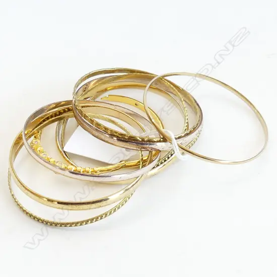 9 ASST GOLD TONE BANGLES + 1 SM ORNATE BANGLE 