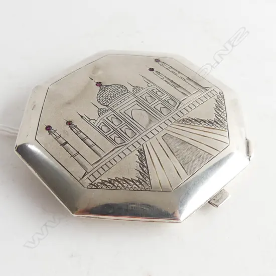 SILVER ISLAMIC COMPACT WITH 5 INSET SMALL RUBYS 96GMS W70MM