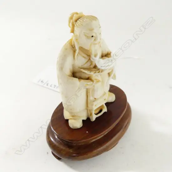 SIGNED IVORY NETSUKE ON STAND MAN WITH FRUIT H50MM