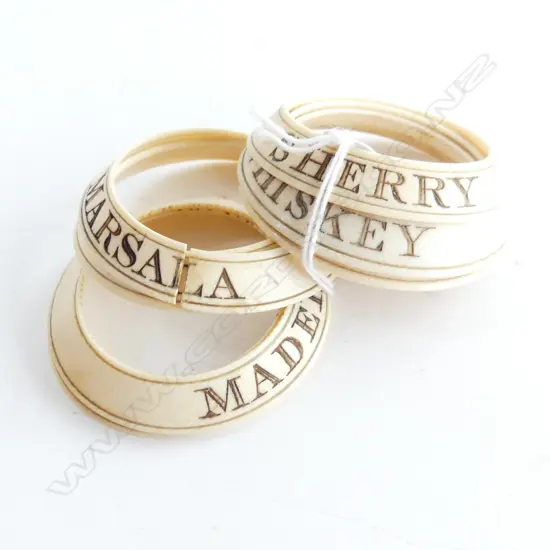 7 ANTIQUE IVORY LIQUOR BOTTLE RINGS 60mm dia...