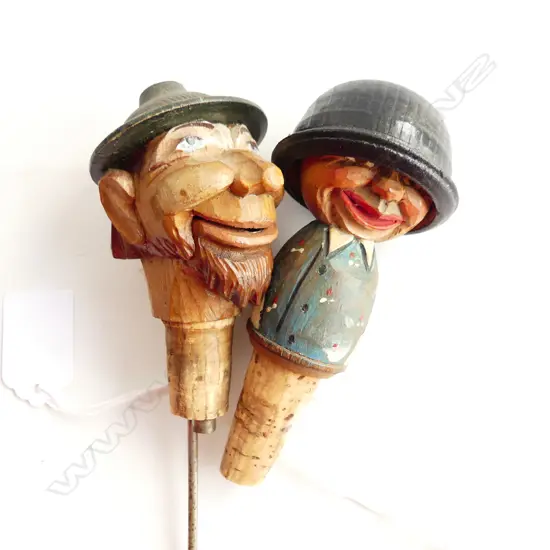 TWO ANRI MECHANICAL WOOD CARVED BOTTLE STOPPERS OF LAUGHING MAN, & TWO FACES WITH SWIVEL HAT, L.120MM