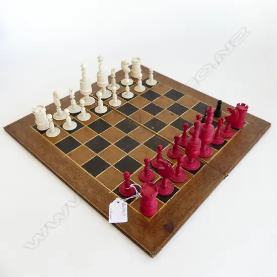 VINTAGE IVORY 19THC CHESS SET WITH GILDED LEATHER PLAYING BOARD 2 REPLACEMENT PAWNS