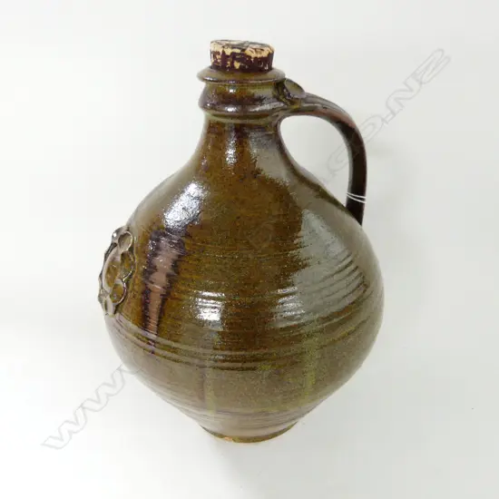 1960S GLAZED STUDIO POTTERY OIL JUG   H 290 MM
