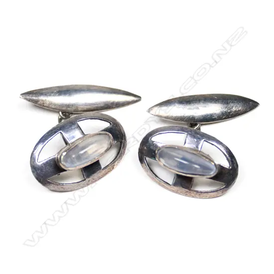 A pair of Art Deco silver and moonstone cufflinks,