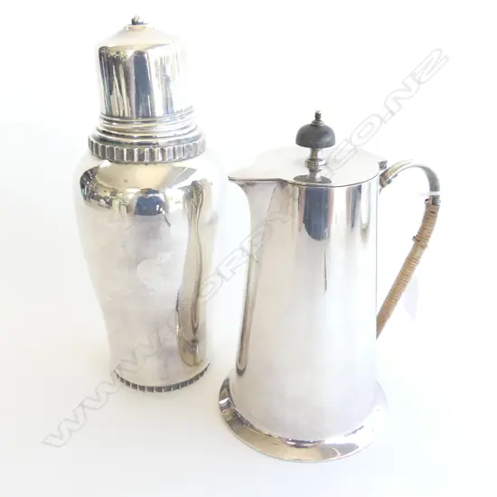 TWO SILVER PLATED ITEMS 1 COCKTAIL SHAKER 230MM HIGH AND ARTS & CRAFTS CANE HANDLED WATERJUG 120MM HIGH 