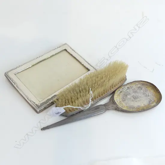 TWO STG SILVER ITEMS 1 SMALL FRAME 160MM HIGH AND CLOTHES BRUSH 