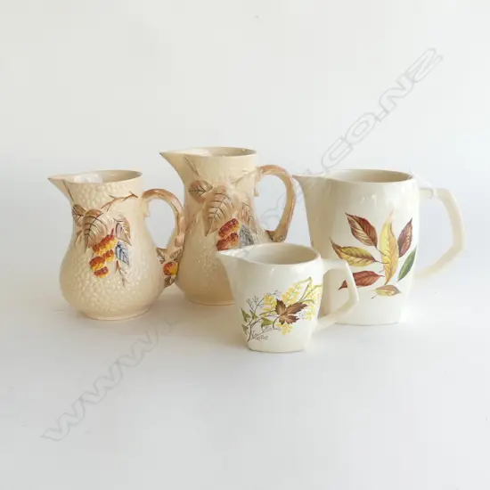 FOUR CERAMIC JUGS TWO CROWN LYNN IN GOLDEN FALL PATTERN 