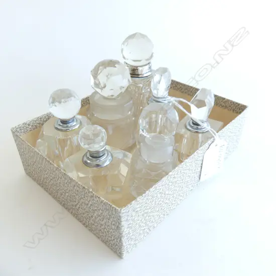 7 CRYSTAL PERFUME BOTTLES H.95mm