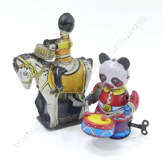 2 VINTAGE TIN TOYS; ENGLISH DRUMMER ON HORSEBACK, CHINESE PANDA H.150mm