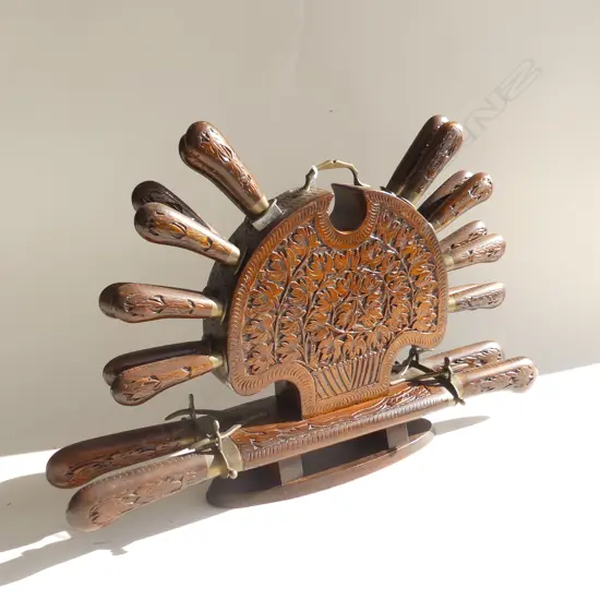 VINTAGE INDIAN CARVED WOODEN DISPLAY STAND WITH 20 PC CUTLERY SET INCL CARVERS ETC.