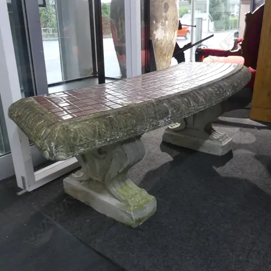 SEMI CIRCULAR TILE TOPPED GARDEN SEAT, ON ' FAUX ' LION CONCRETE SUPPORTS, DAMAGE TO FRONT CORNER,  1500 X 500 X 450mm.