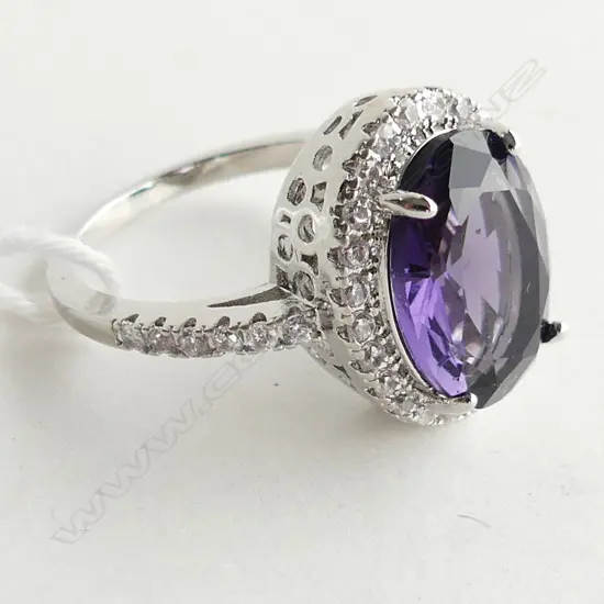 SILVER COLOURED OVAL PURPLE STONE/DIAMANTE DRESS RING