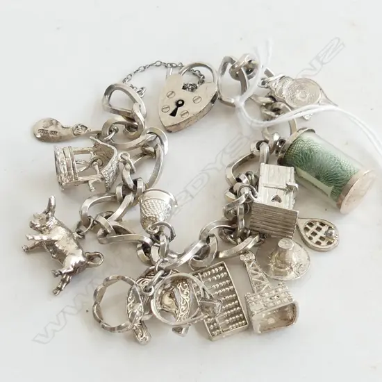 SILVER CHARM BRACELET LADEN W CHARMS