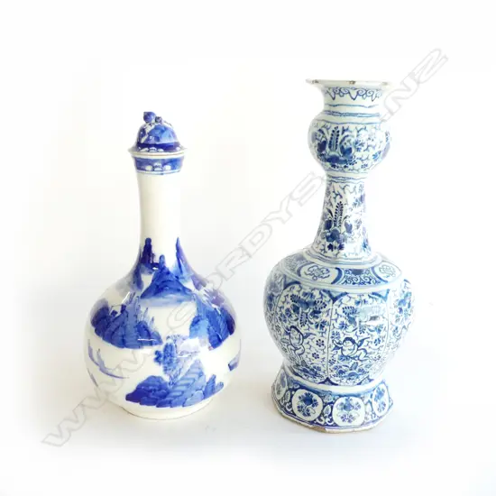 2 STONEWARE VASES BL/WH BOTH OF BULBOUS SHAPE. ONE CHINESE WITH STOPPER H.300mm OTHER MIDDLE EASTERN. H.320mm
