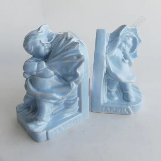 PR 1940'S BLUE ENGLISH CHINA BOOKENDS WINDSWEPT CHILDREN ÁPRIL' & 'MARCH'