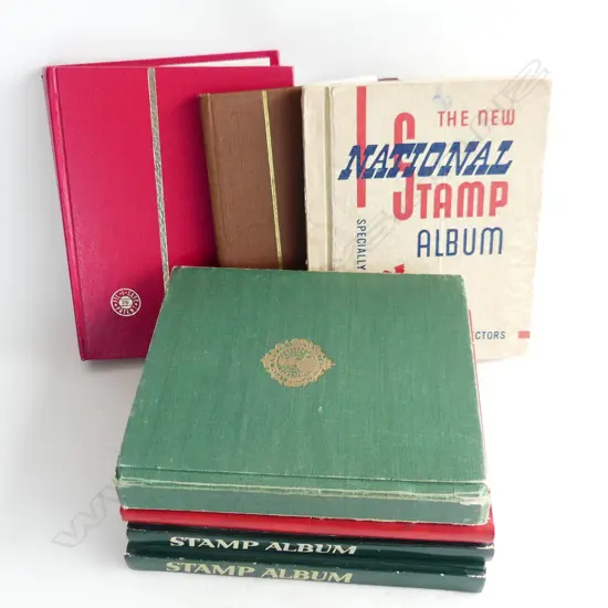 7 SMALL ALBUMS OF NZ & WORLD STAMPS H.210mm