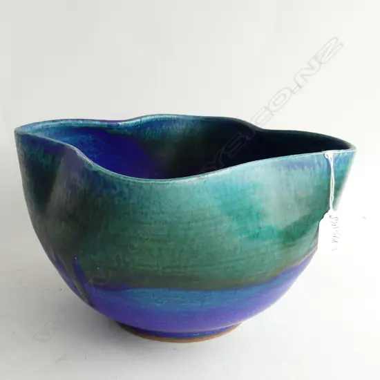 GRAEME STORM LGE BLUE/PURPLE/GREEN POTTERY BOWL QUATREFOIL SHAPE glaze fritting to rim. Dia.290mm.