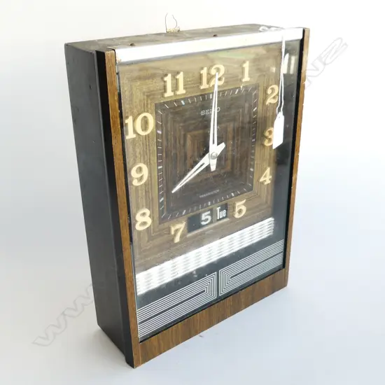 SEIKO BATTERY OPERATED TRANSISTOR WALL CLOCK - STRIKING DAY-DATE CALENDAR  320 X 230MM 