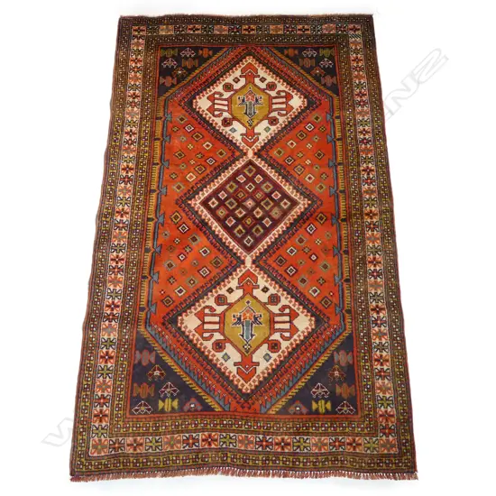 An old Kazak rug,