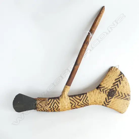 MELANESIAN STONE ADZE IN WOVEN CANE WITH WOOD HANDLE L620MM