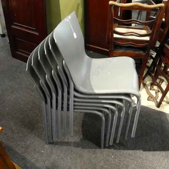 SIX  STURDY GREY STACKING CHAIRS