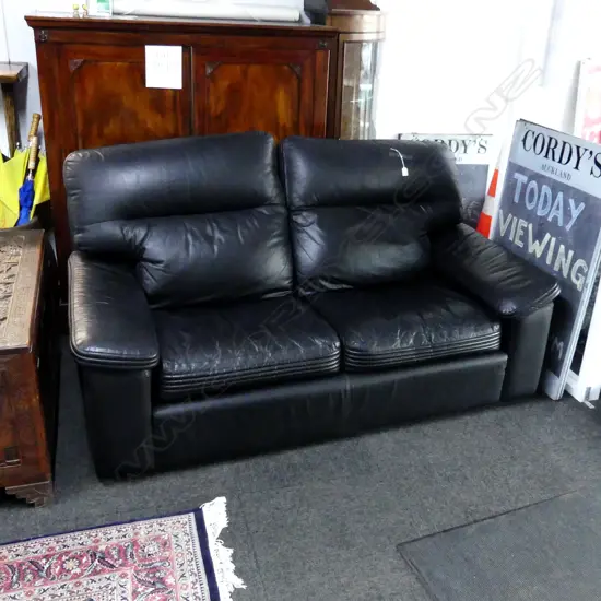 'MORAN' BLACK LEATHER TWO SEATER COUCH
