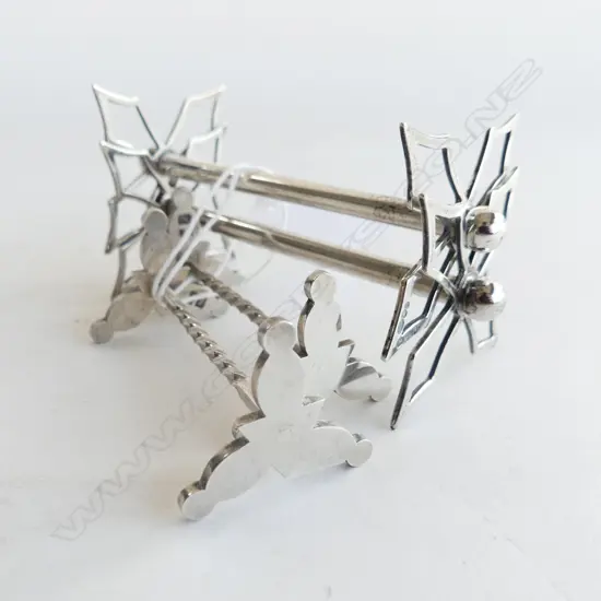 PAIR SILVER KNIFE RESTS AND PAIR OF SILVER PLATE KNIFE RESTS