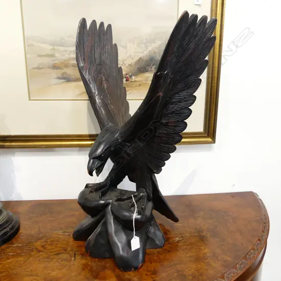 LARGE VINTAGE ROSEWOOD CARVED EAGLE H.620mm alighting upon a rocky outcrop