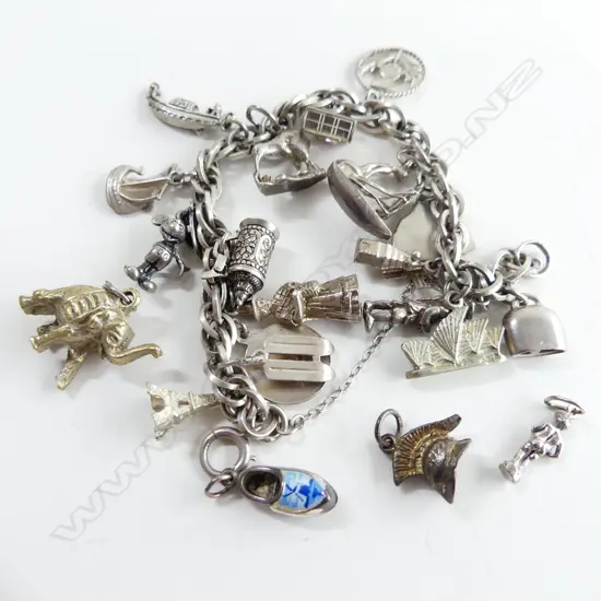 STG SILVER CHARM BRACELET FULL OF CHARMS + 4 EXTRA CHARMS  67.12GMS