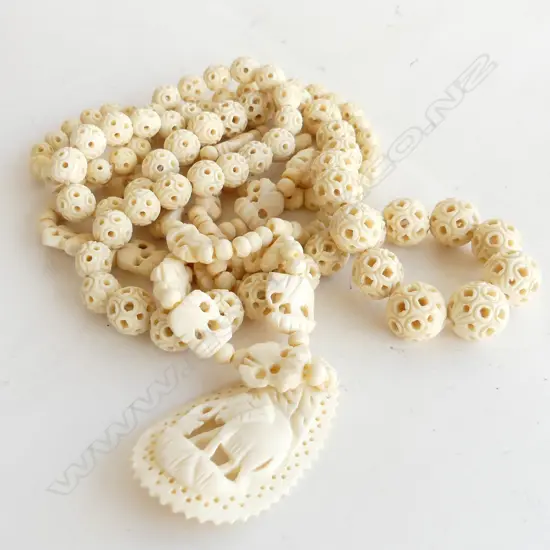 2 CARVED BONE BEAD NECKLACES 