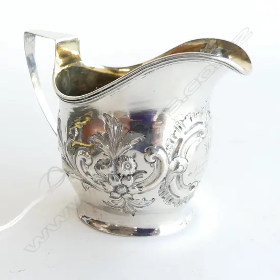 GEO.III SILVER HELMET CREAM JUG EMBOSSED C1810. 87gms