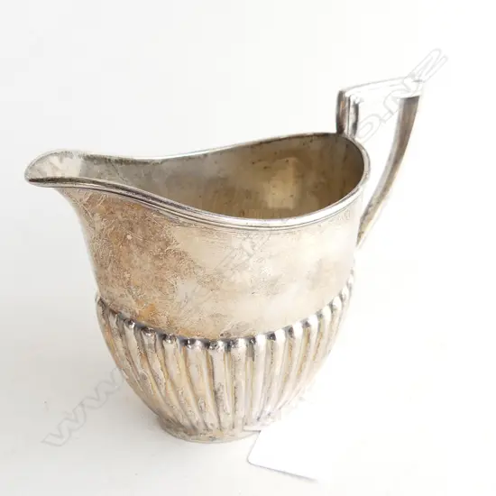 STERLING SILVER MILK JUG.HALLMARK FOR 1908. WALKER AND HALL. 203gms 